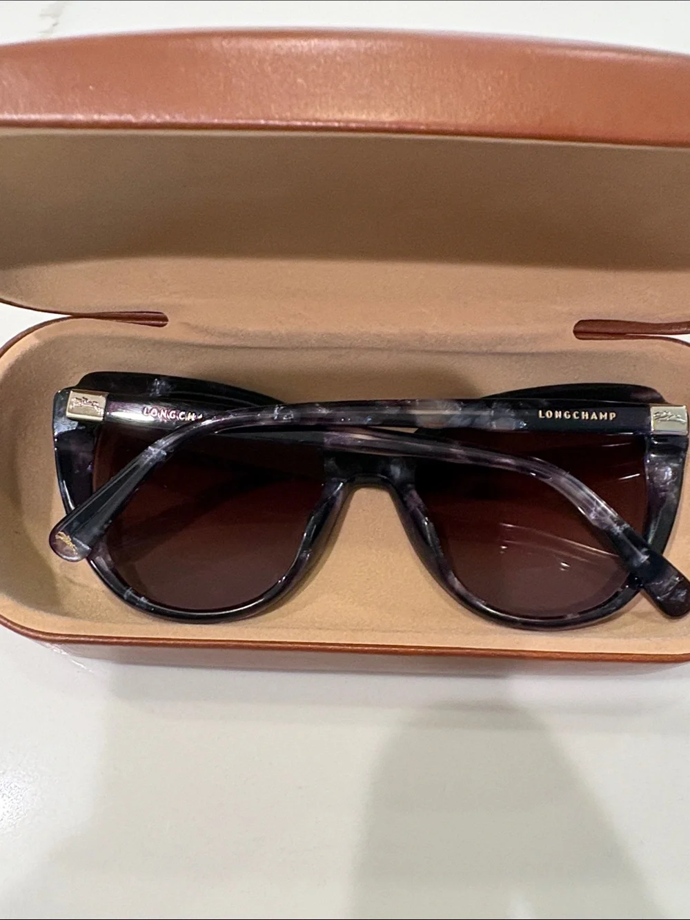Longchamp women’s blue marble cat eye sunglasses